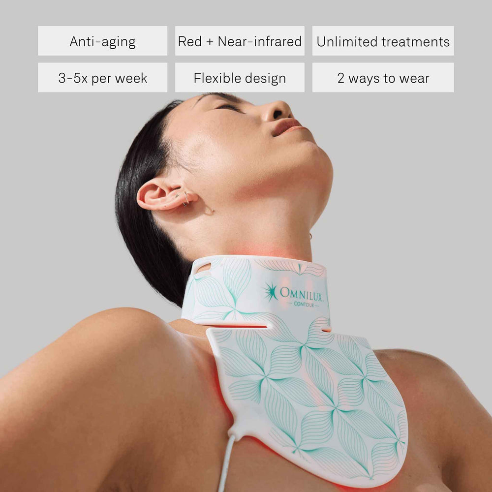 Woman wearing a Omnilux neck decollete device